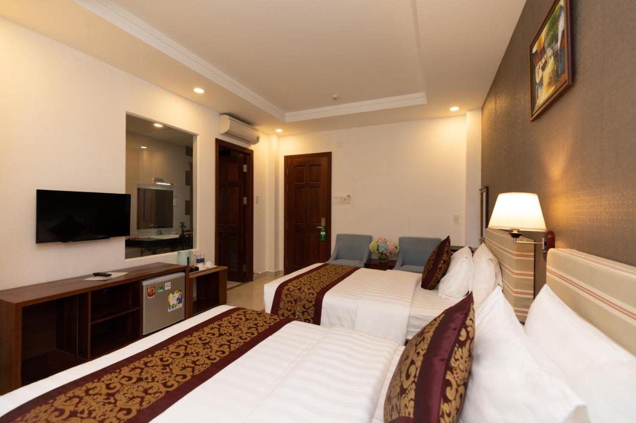 Airport Saigon Hotel - Gan Am Thuc Dem Cho Pham Van Hai Хошимін Екстер'єр фото