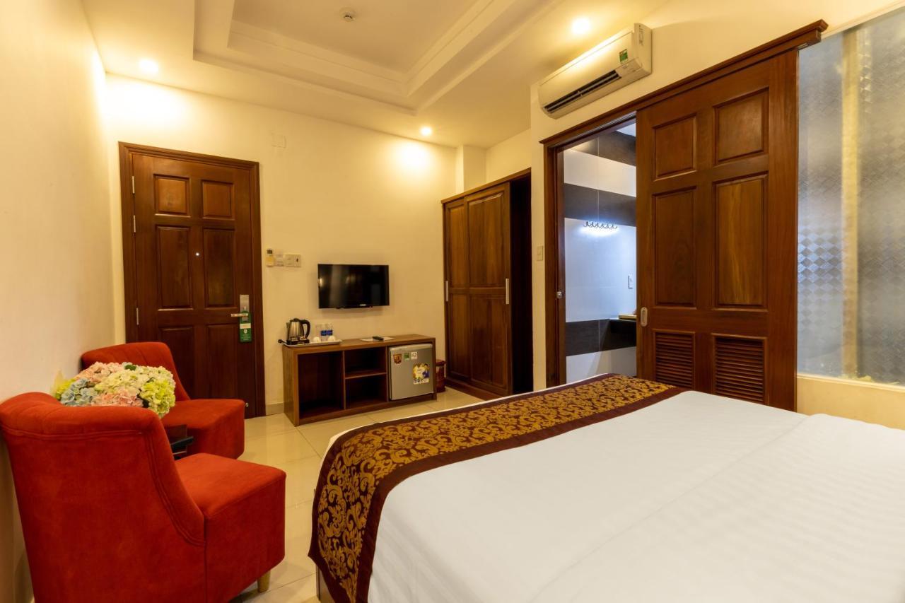 Airport Saigon Hotel - Gan Am Thuc Dem Cho Pham Van Hai Хошимін Екстер'єр фото